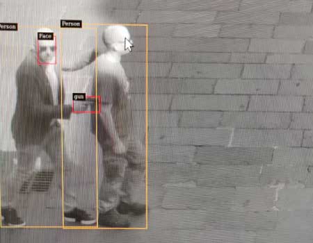 Weapon Detection Software detecting a small magazine-fed handgun in a public space in Italy.